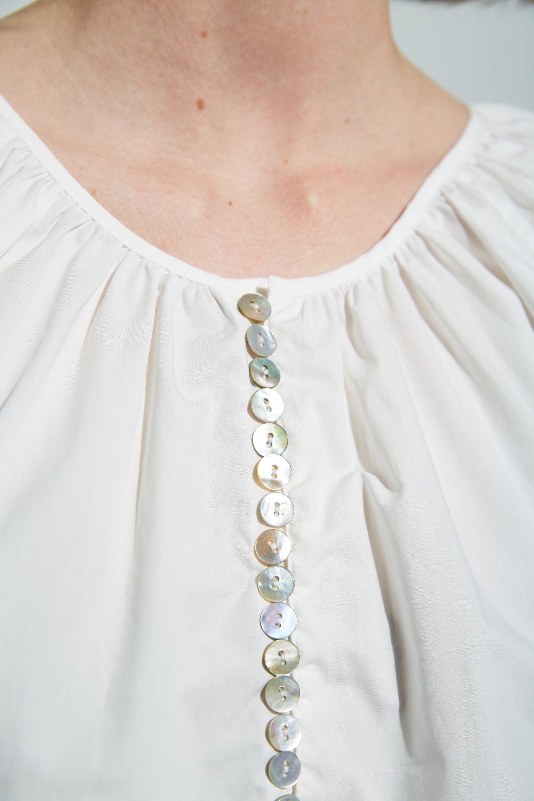 Shirt with mother of pearl buttons