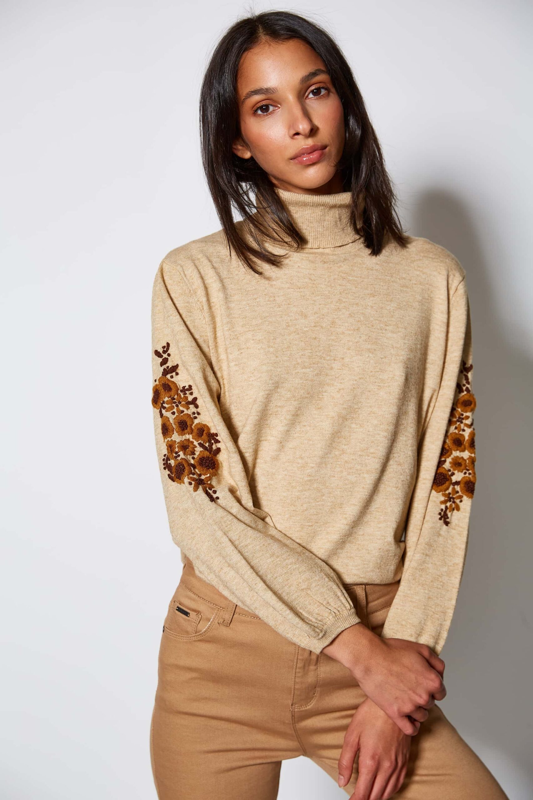 Sweater with floral detail on sleeves