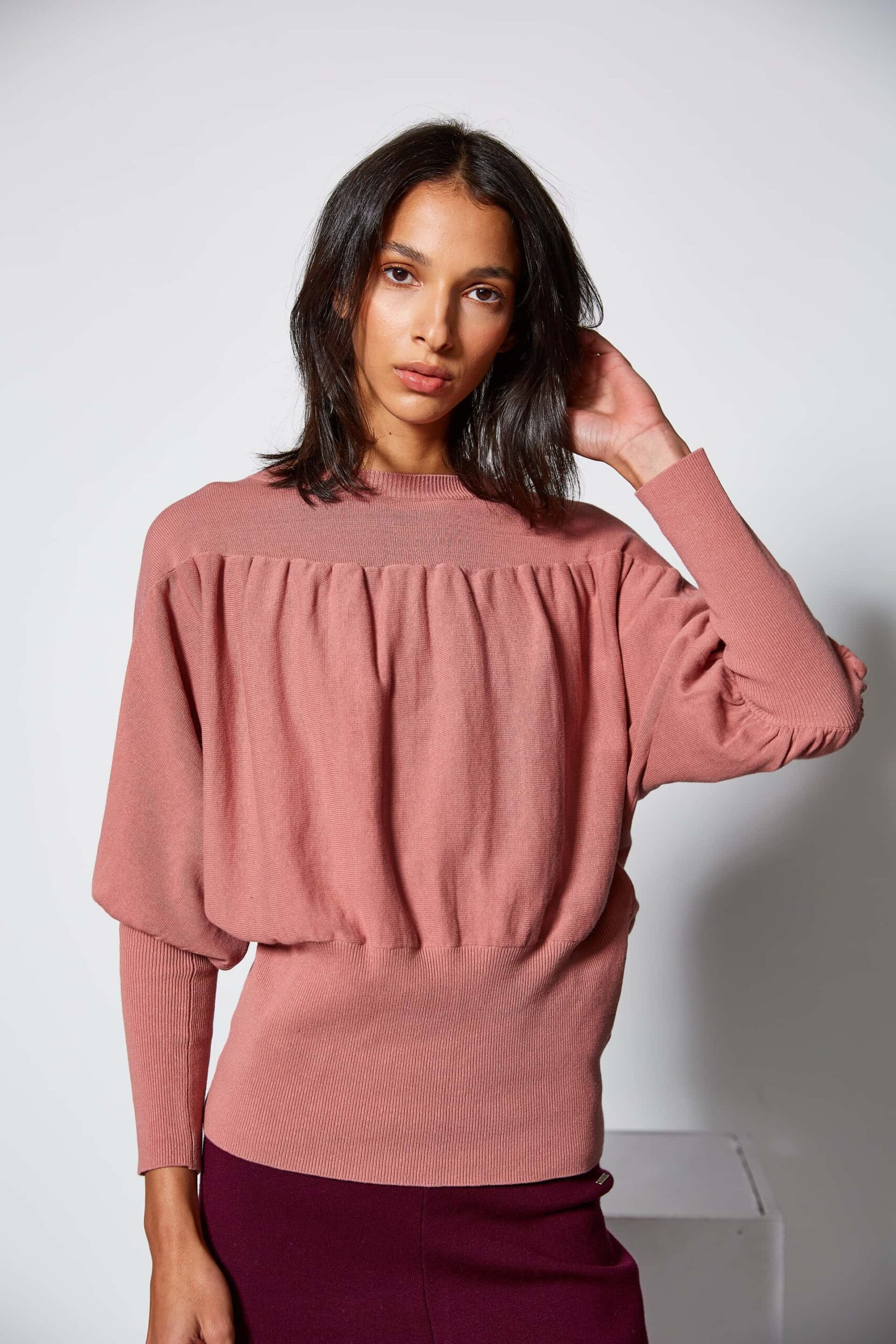 Sweater with gatherings
