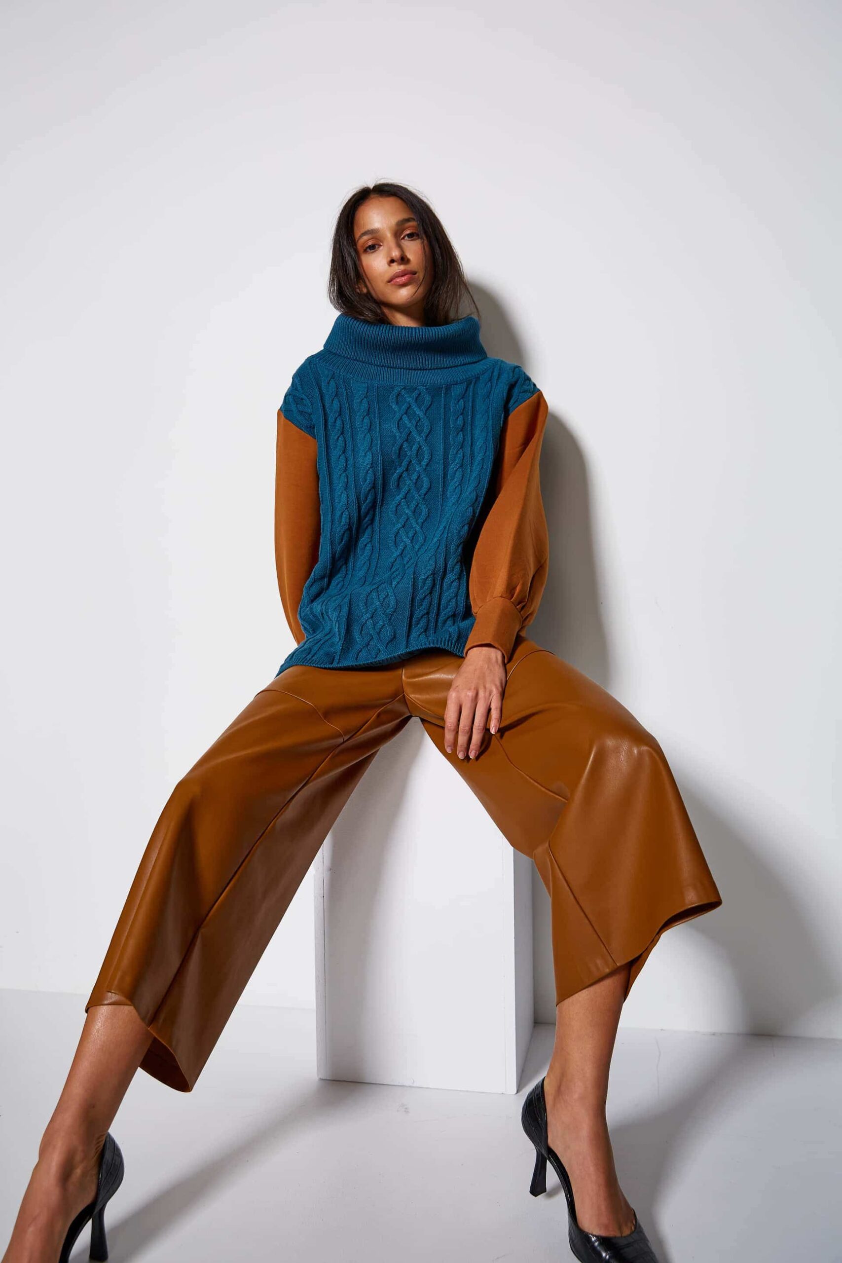 Cable knit and neoprene sweater