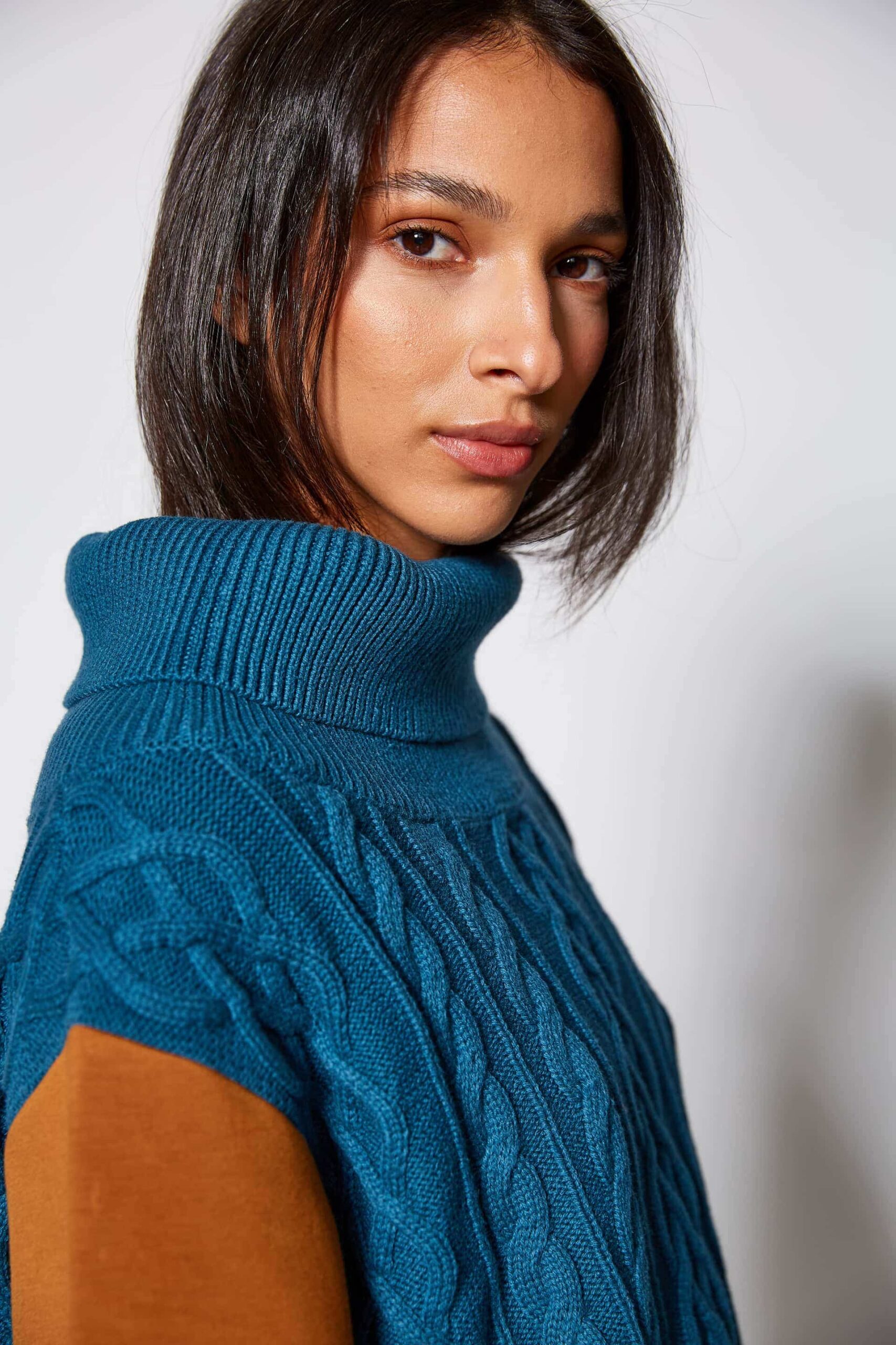 Cable knit and neoprene sweater